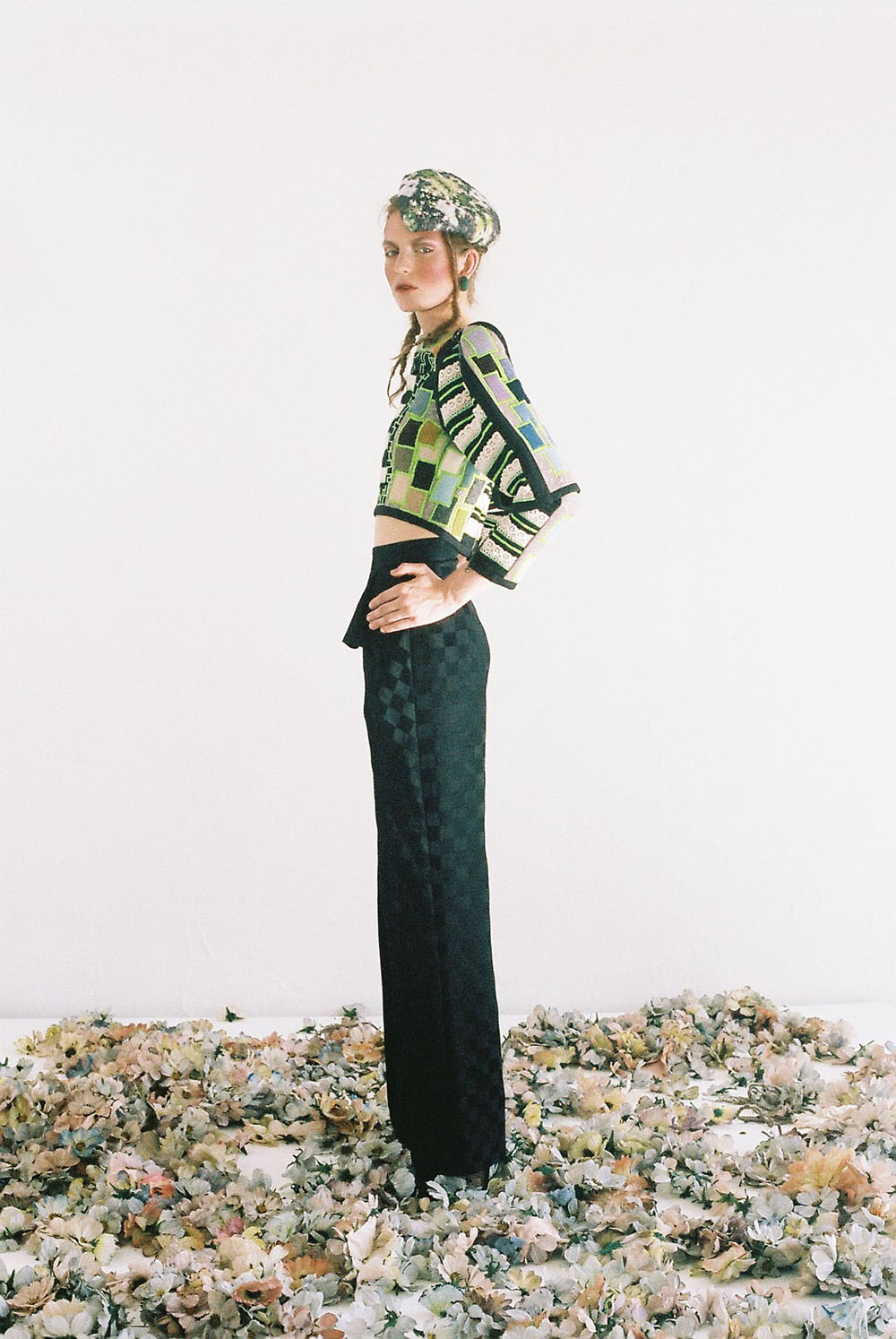 PHOENIX MAGAZINE Top NOVA CHIU, Trousers ANDREW MAJTENYI, Shoes BERNARD, Earrings MCL Jewellery, Hat E WHA LIM