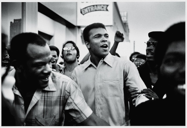 Muhammad Ali walks through the streets of New York City with members of the Black Panther Party in September 1970. Credit: David Fenton/Archive Photos/Getty Images